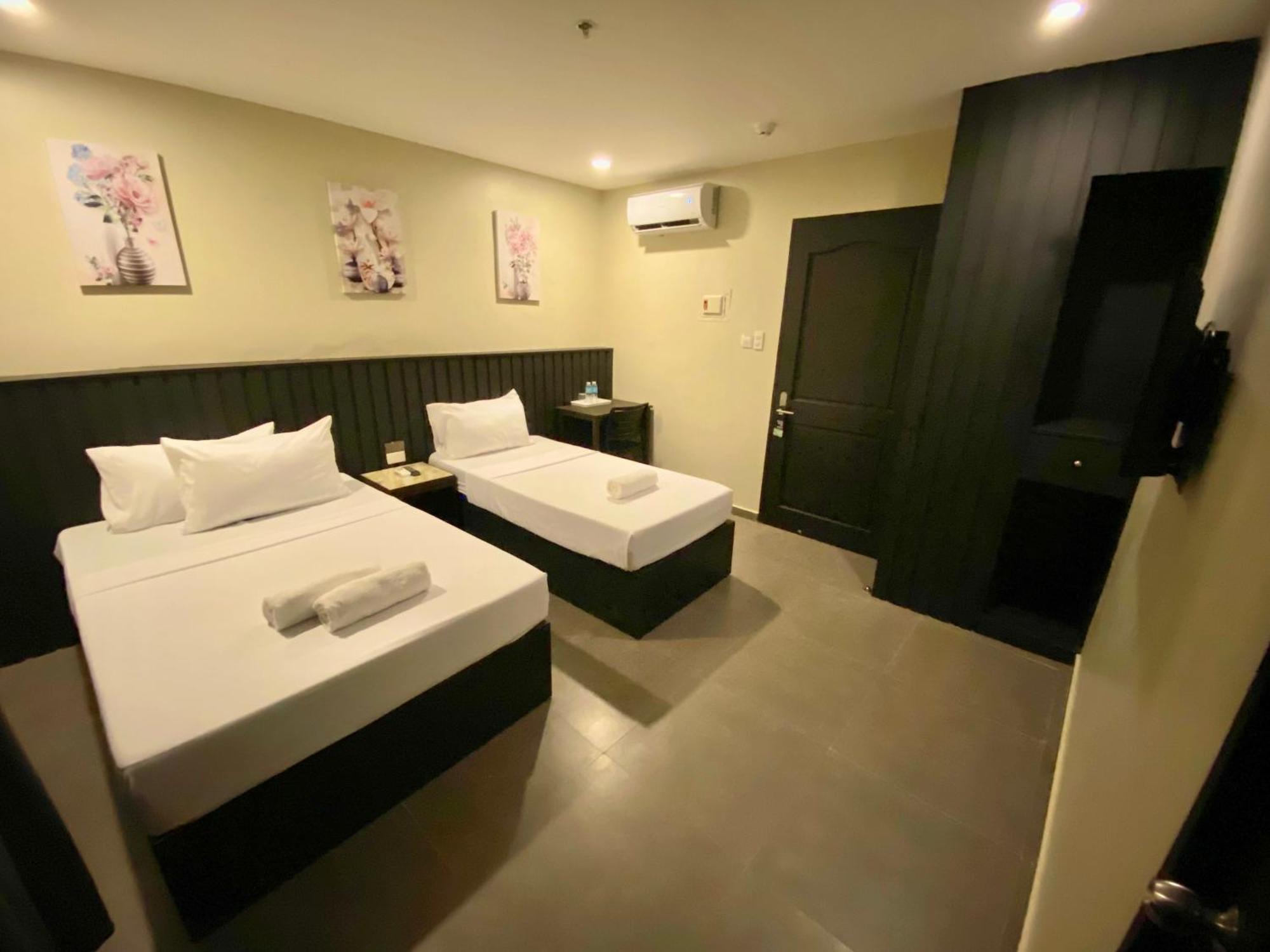 Rudolfo Suites Roxas Exterior foto