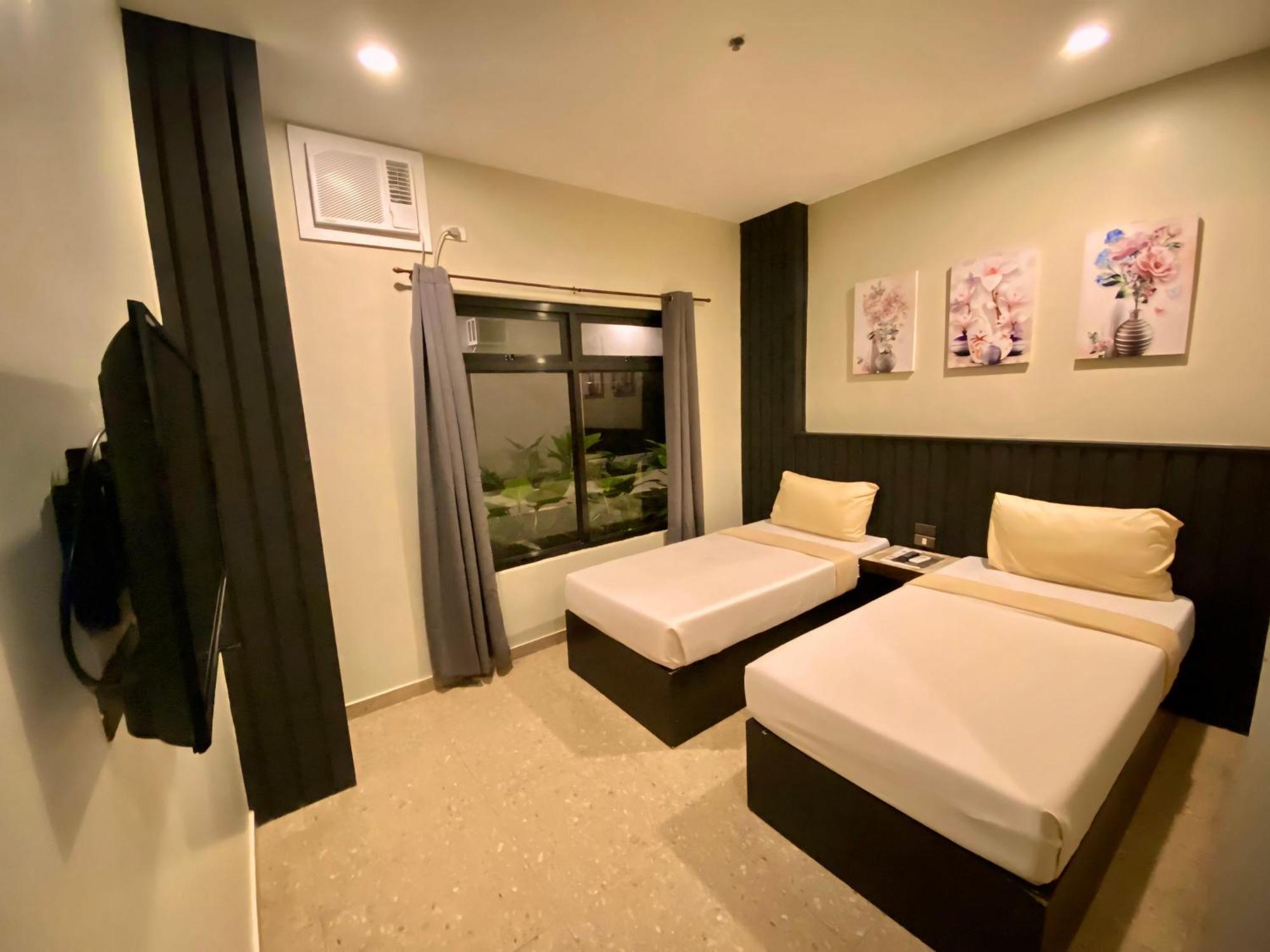 Rudolfo Suites Roxas Exterior foto