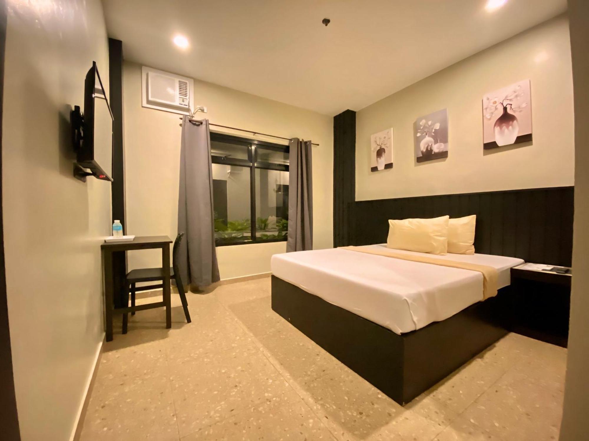Rudolfo Suites Roxas Exterior foto