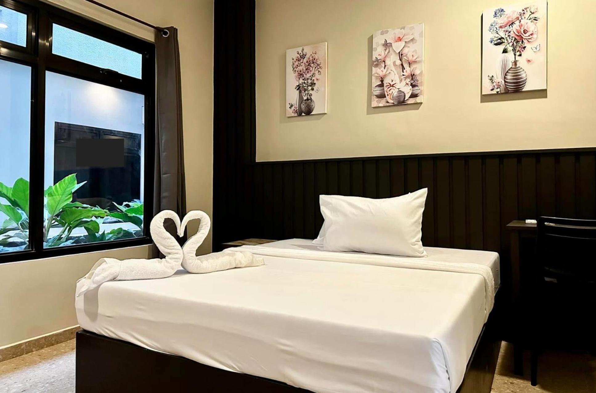 Rudolfo Suites Roxas Exterior foto